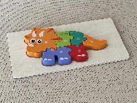 Dřevěné puzzle malý dinosaurus 1